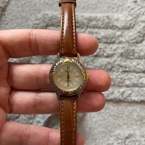 Relic watch with genuine leather strap.